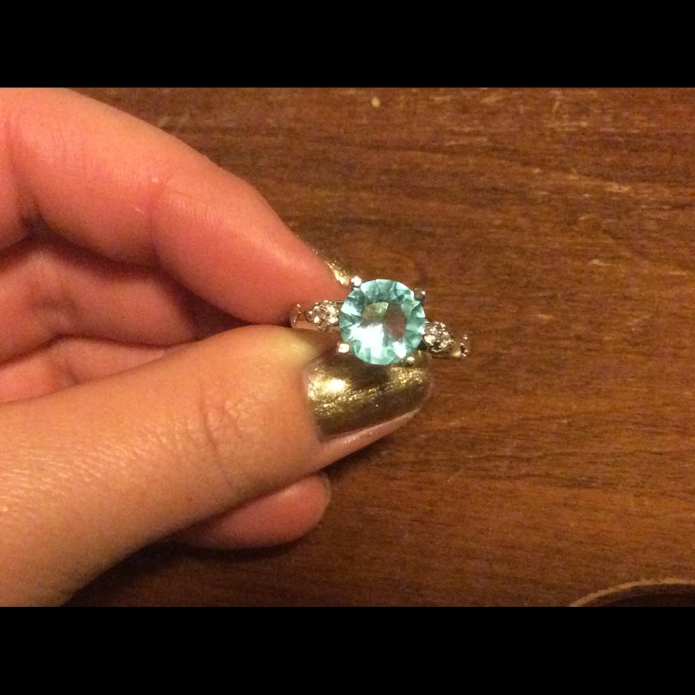 Light blue and clear crystal ring set in silver